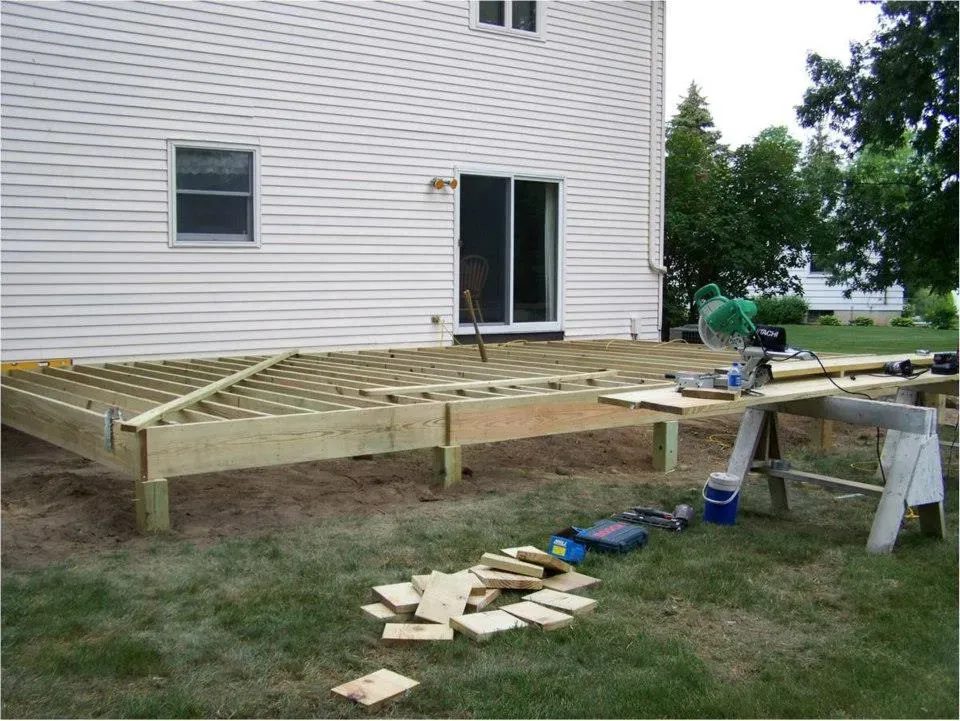 Different types of decks available in Lansing MI including wood, composite, and multi-level designs